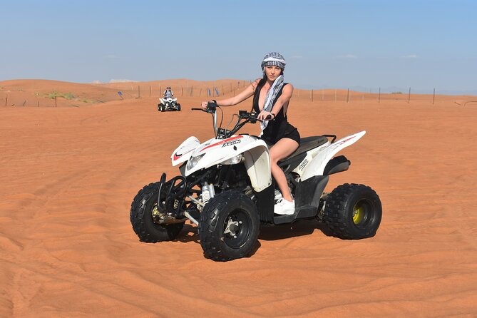 Sunset Desert Safari Quad bike Camel ride Sand Board & BBQ Dinner - Dune Bashing and Sunset Photos in the Sand