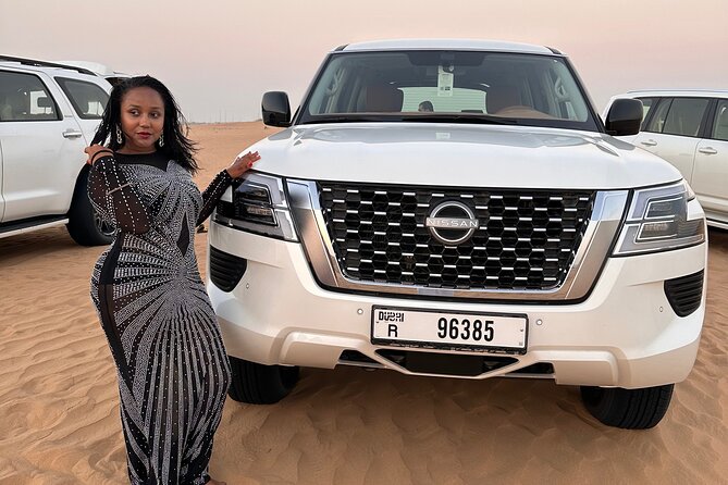 Sunset Desert safari with Camel Ride Sand Board & BBQ Dinner - Sandboarding and sunset photographs