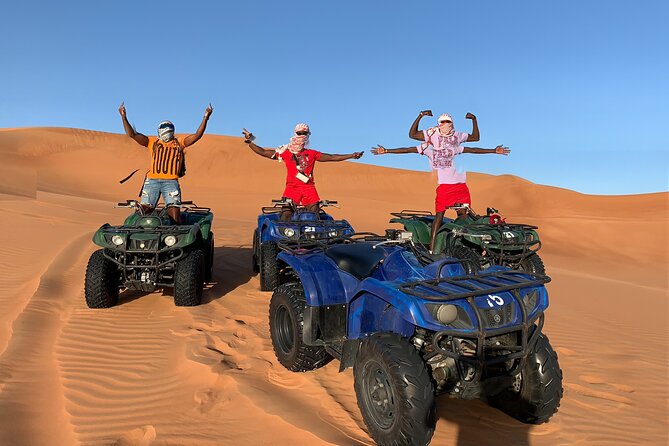Sunset Quad/Buggy Tour & BBQ Evening - Sandboarding on the high dunes
