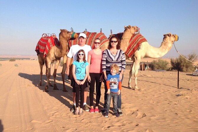 Thrilling Desert Safari Dubai Adventure with Sand Boarding and Barbecue Dinner - Camel riding, coffee, dates, and the Bedouin-style camp