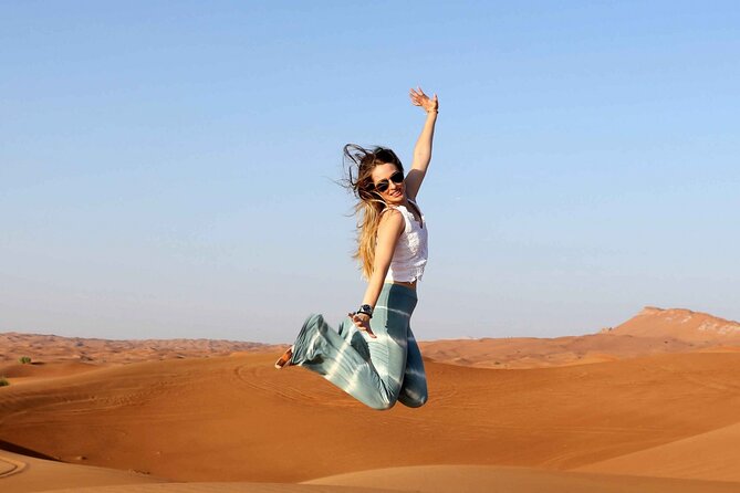 Thrilling Desert Safari Dubai Adventure with Sand Boarding and Barbecue Dinner - Barbecue buffet and evening entertainment