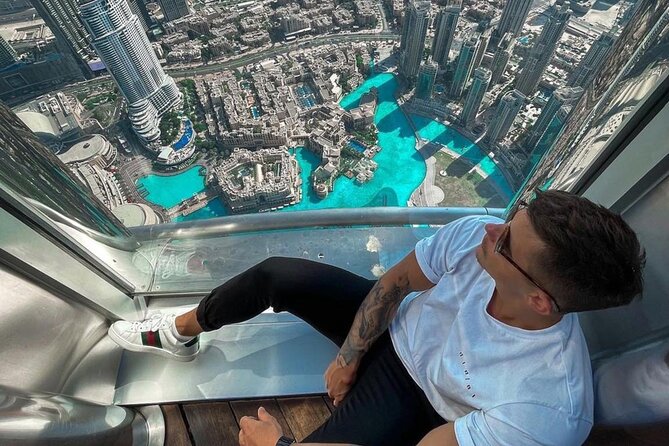 Top of Burj Khalifa & Sky Views Dubai Tour with Transfers - What makes the Sky Views glass slide different