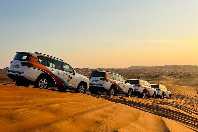 Ultimate Evening Desert Safari with Quad Biking & VIP Service - Sunset photos, sandboarding, and a short camel ride