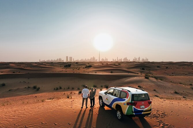 VIP Dubai Sunset Desert Safari: Camel Ride, BBQ, Unlimited Spirit - Camel riding and sandboarding at the camp